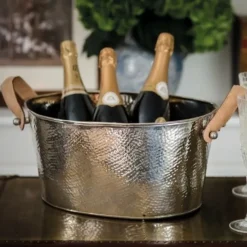 Champagnekøler med læderhåndtag - hamret look